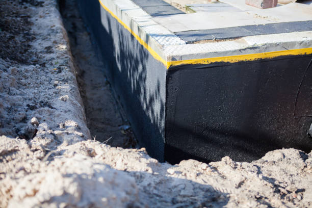 Professional Waterproofing technician working in Fulton, MD